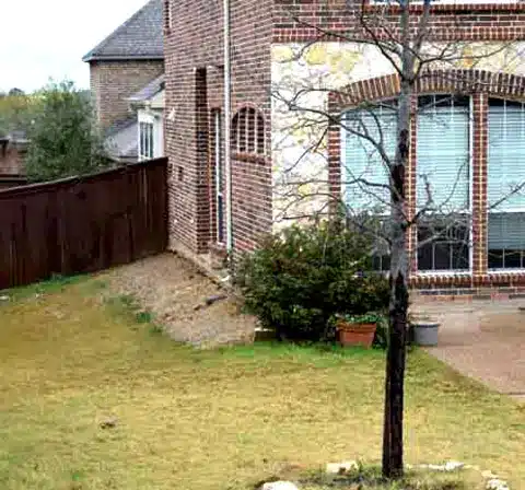 During Foundation Repair - House is lifted side view